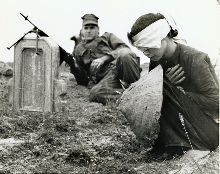 John Schneider - Viet Cong Suspect with U.S. Marine