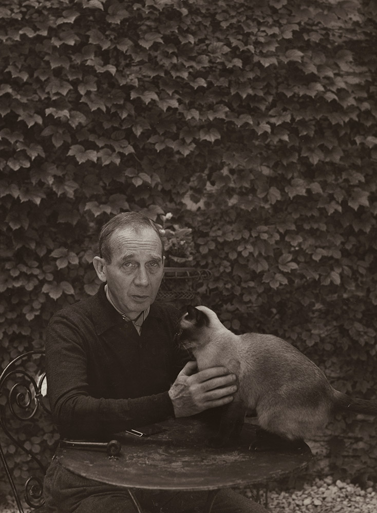 Kenneth Heilbron - Portrait of a Man (Perhaps Photographer's Father) with Pekinese Cat