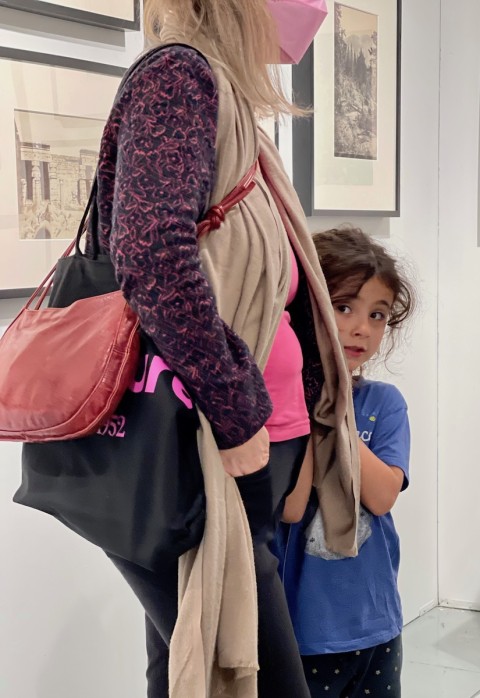 Boston Museum of Fine Art Curator Kristen Gresch and her shy daughter visited the Vintage Works booth.